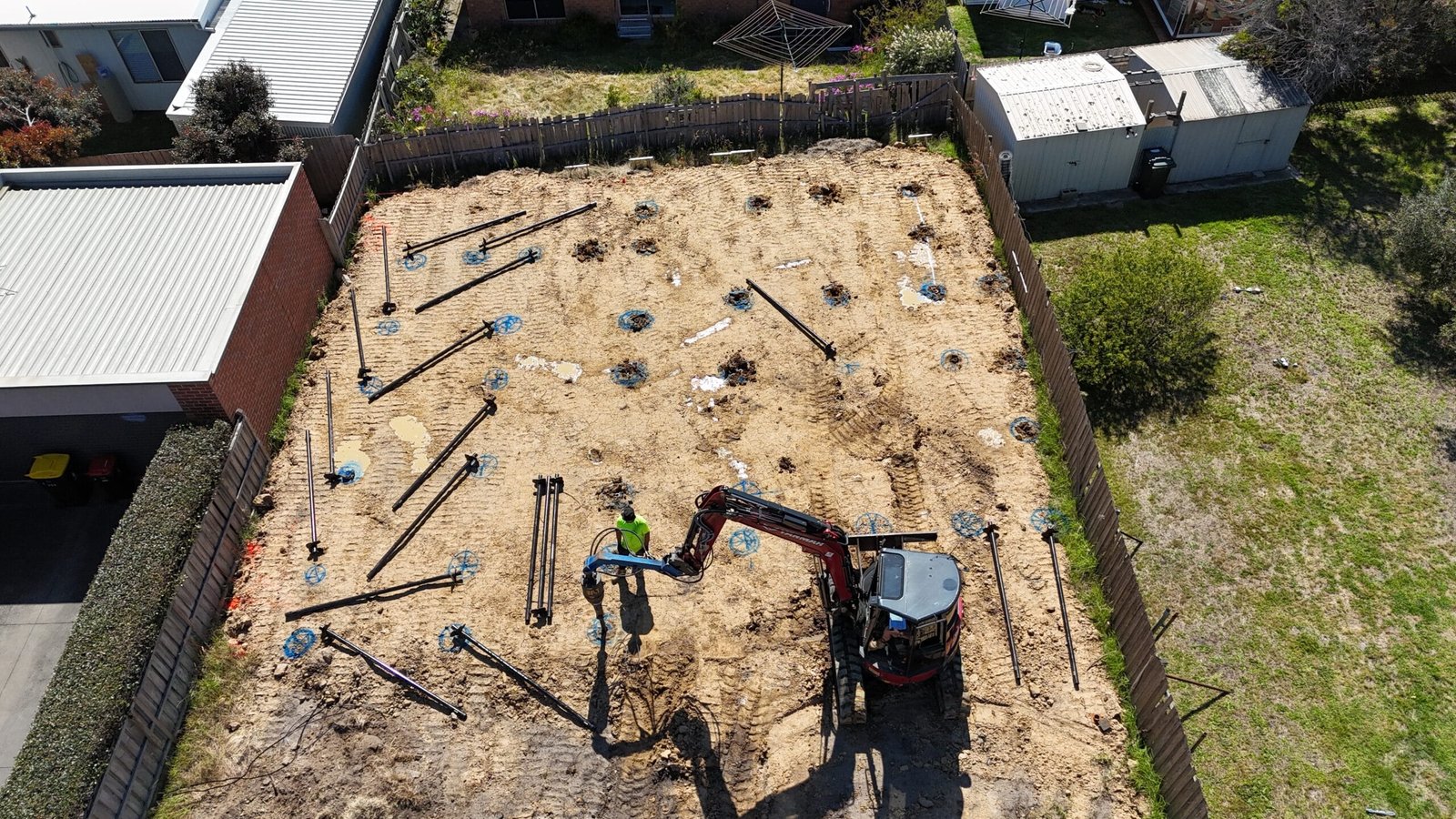 Screw pile foundation installation for a deck on a Melbourne property